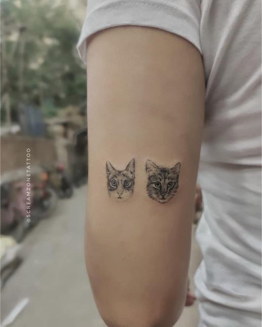 Cat Minimal Portrait tattoo, Screamzonetattoo tattoo studio in Mumbai