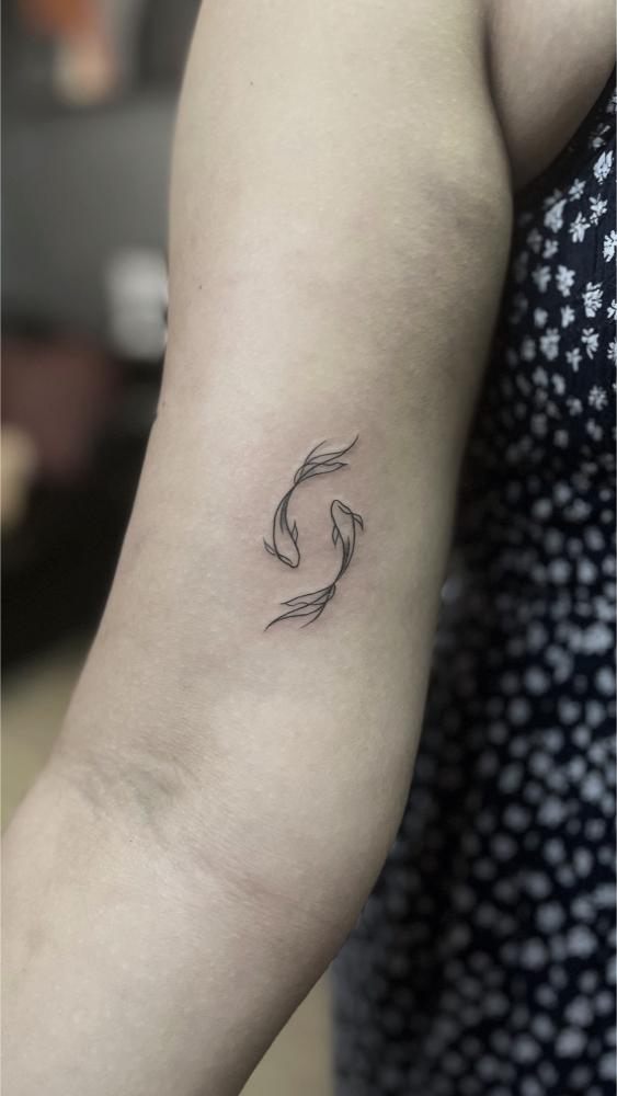 Fish Minimal Piscies tattoo, Screamzonetattoo tattoo studio in Mumbai