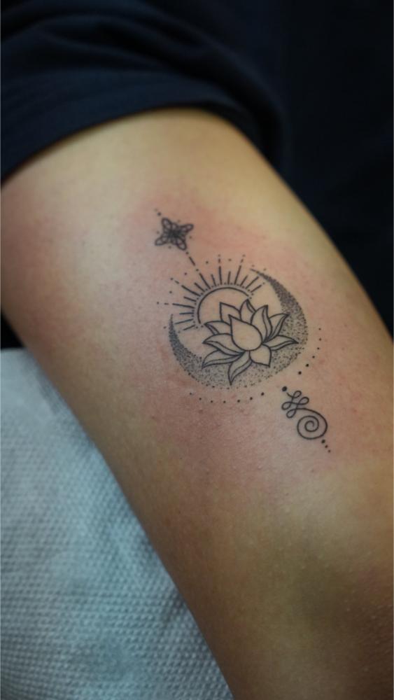 Flower Small tattoo, Screamzonetattoo tattoo studio in Mumbai