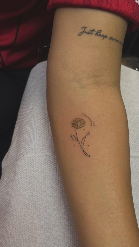 Minimal Sunflower tattoo, Screamzonetattoo tattoo studio in Mumbai