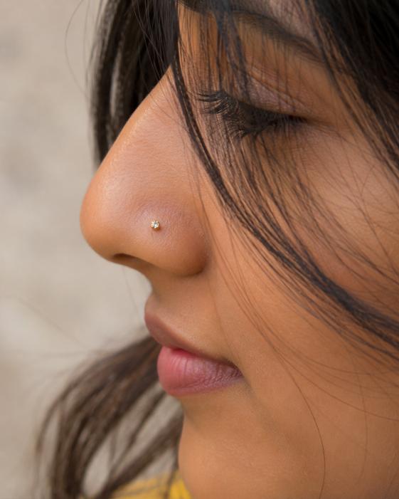 Nose piercing at Screamzonetattoo, a piercing studio in Ghatkopar Mumbai