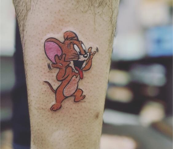 Tom and jerry tattoo colour tatttoo of a jerry protrait realim in mumbai , screamzonetattoo 