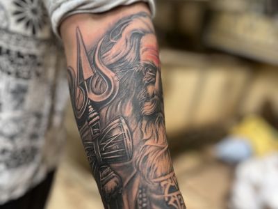 tattoo near ghatkopar of trishul holding by aghosi baba