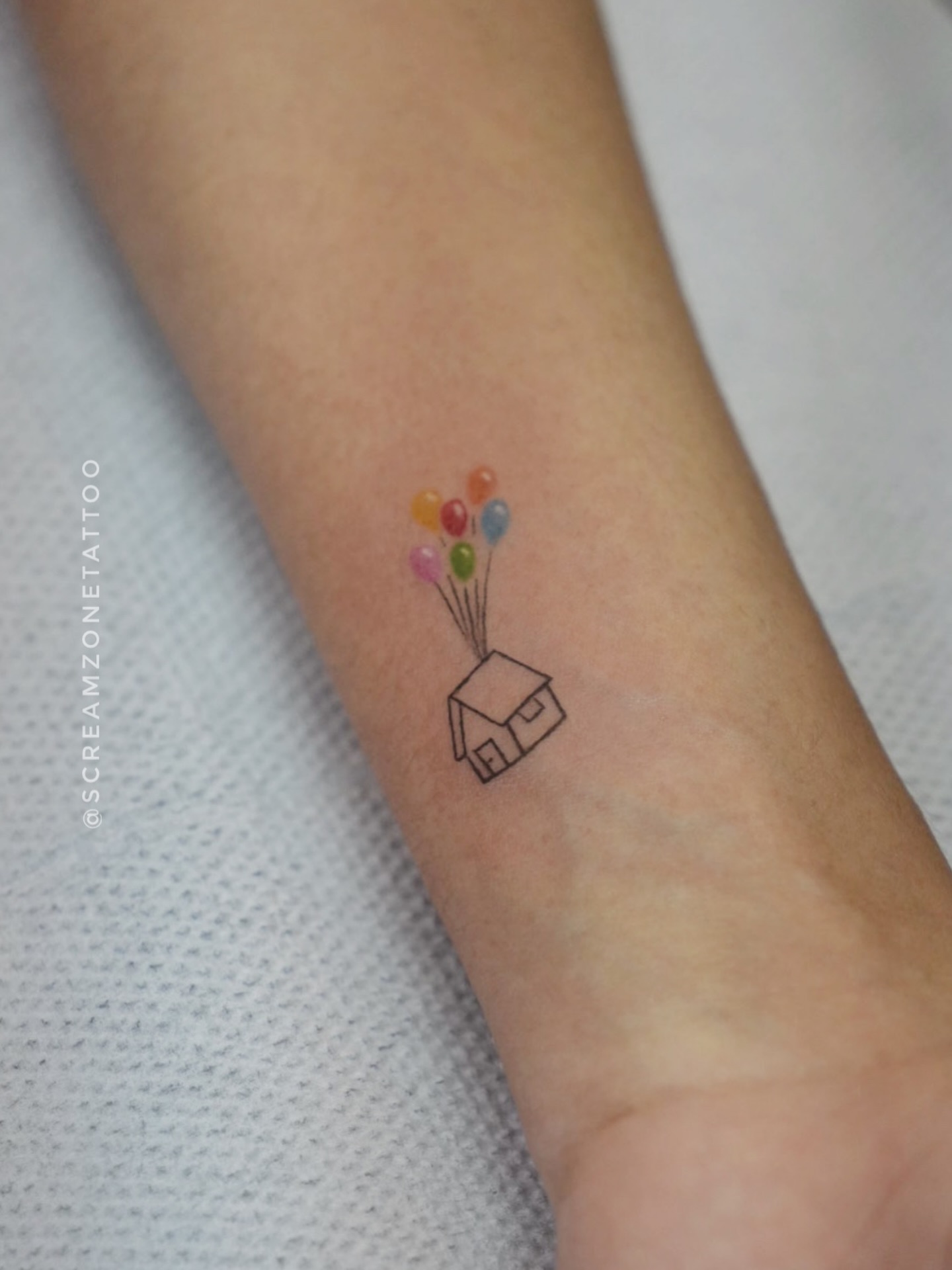 Minimal colour house tattoo design inked at our Ghatkopar tattoo studio