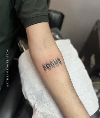 Custom font tattoo done at a Ghatkopar tattoo studio