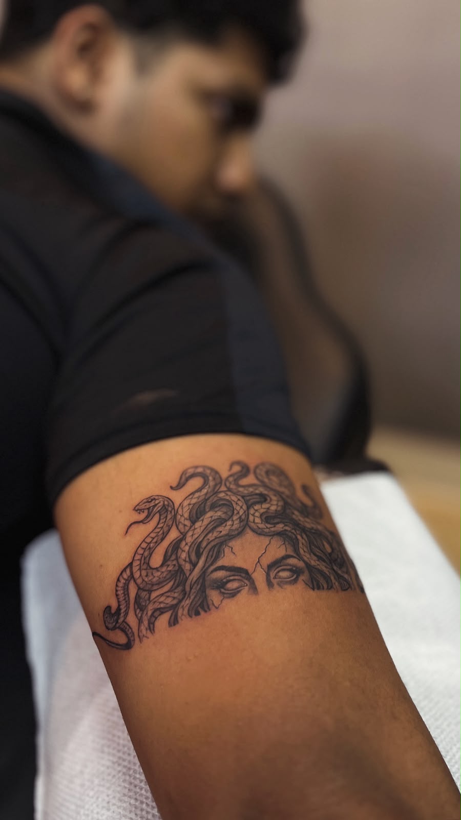 Snake God on Tricep tattoo design and meaning - Spiritual tattoo by Screamzonetattoo, Ghatkopar Mumbai