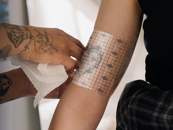 Tattoo aftercare guidance taught at a tattoo studio in Mumbai